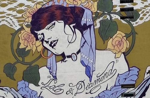 Street Art alla Garbatella, dalla bella ostessa a Sordi-Marchese del Grillo